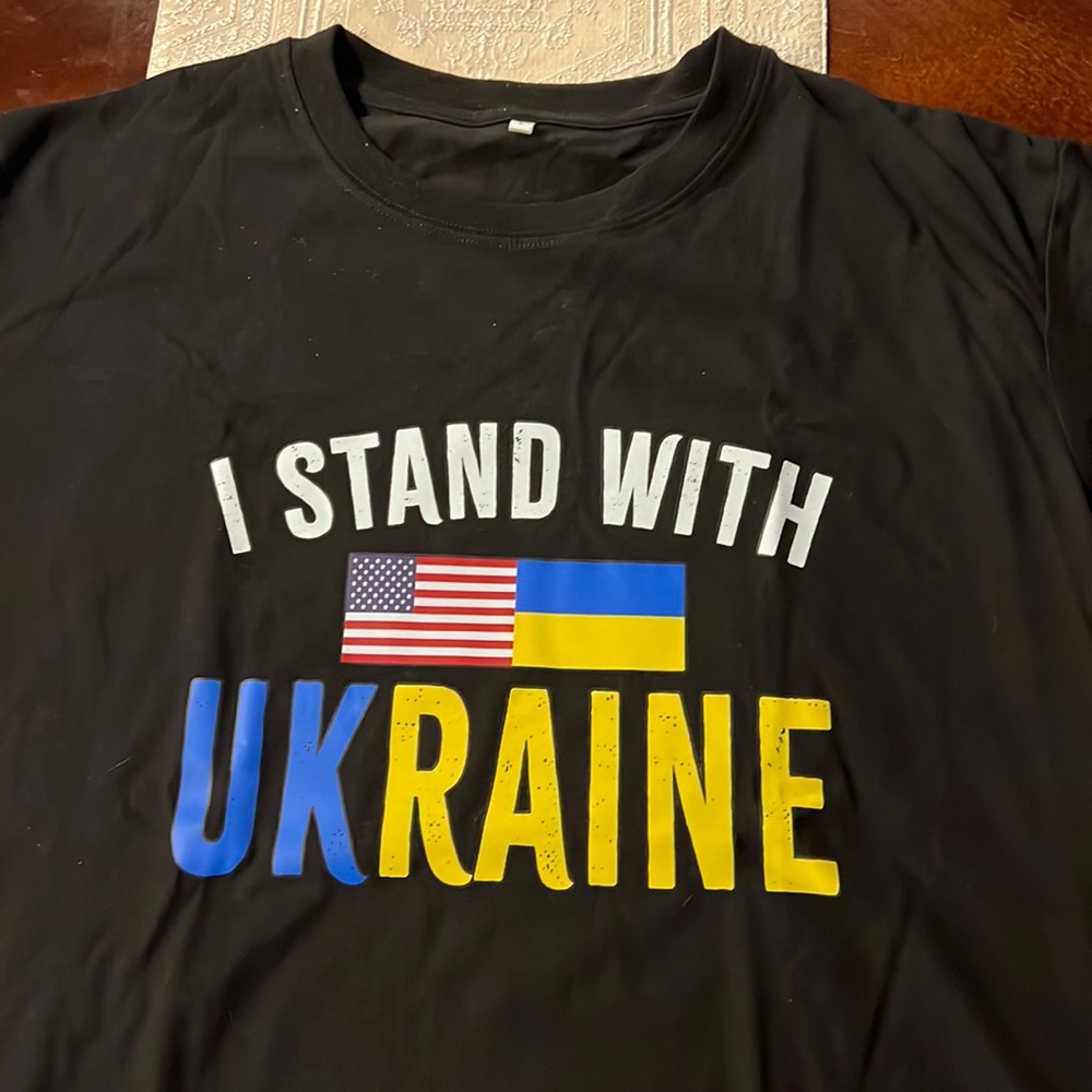 Large T-shirt sporting Ukraine.